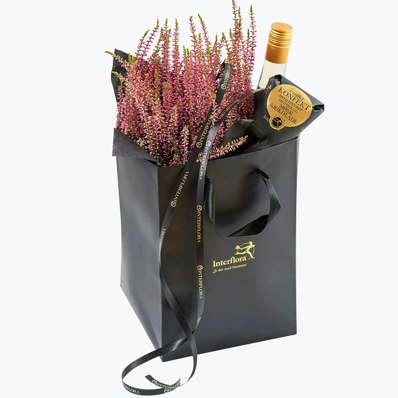 Red Poinsettia in a giftbag