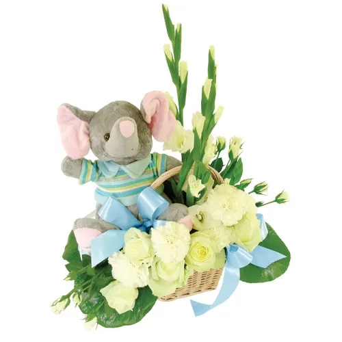 Flowers for toddlers, composition of white mini roses, white mini gladiolas, green fern in a basket, grey elephant in a coloured blouse mascot, flowers for boys