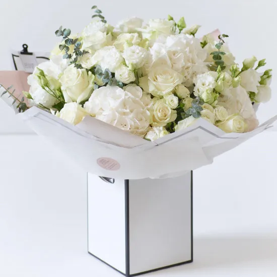 Beautifully Simple Showstopper White Flower Bouquet.