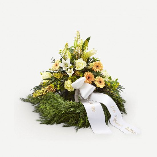 Wreath with golden flowers and ribbon