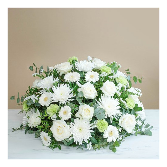 Funeral centrepiece in white tones
