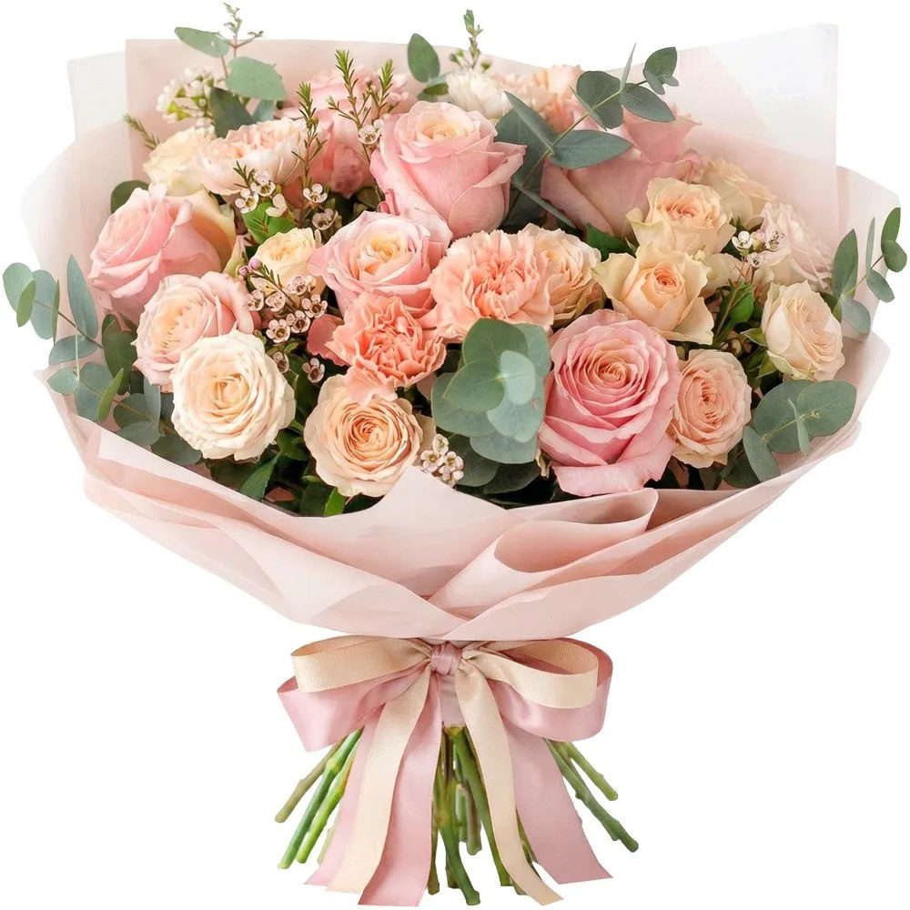 A beautiful, lavish bouquet in the trendy Peach Fuzz color scheme (a delicate, peach-pink shade). The arrangement features a variety of blooms, including double roses, delicate carnations, and lisianthus, interspersed with eucalyptus sprigs and tiny white