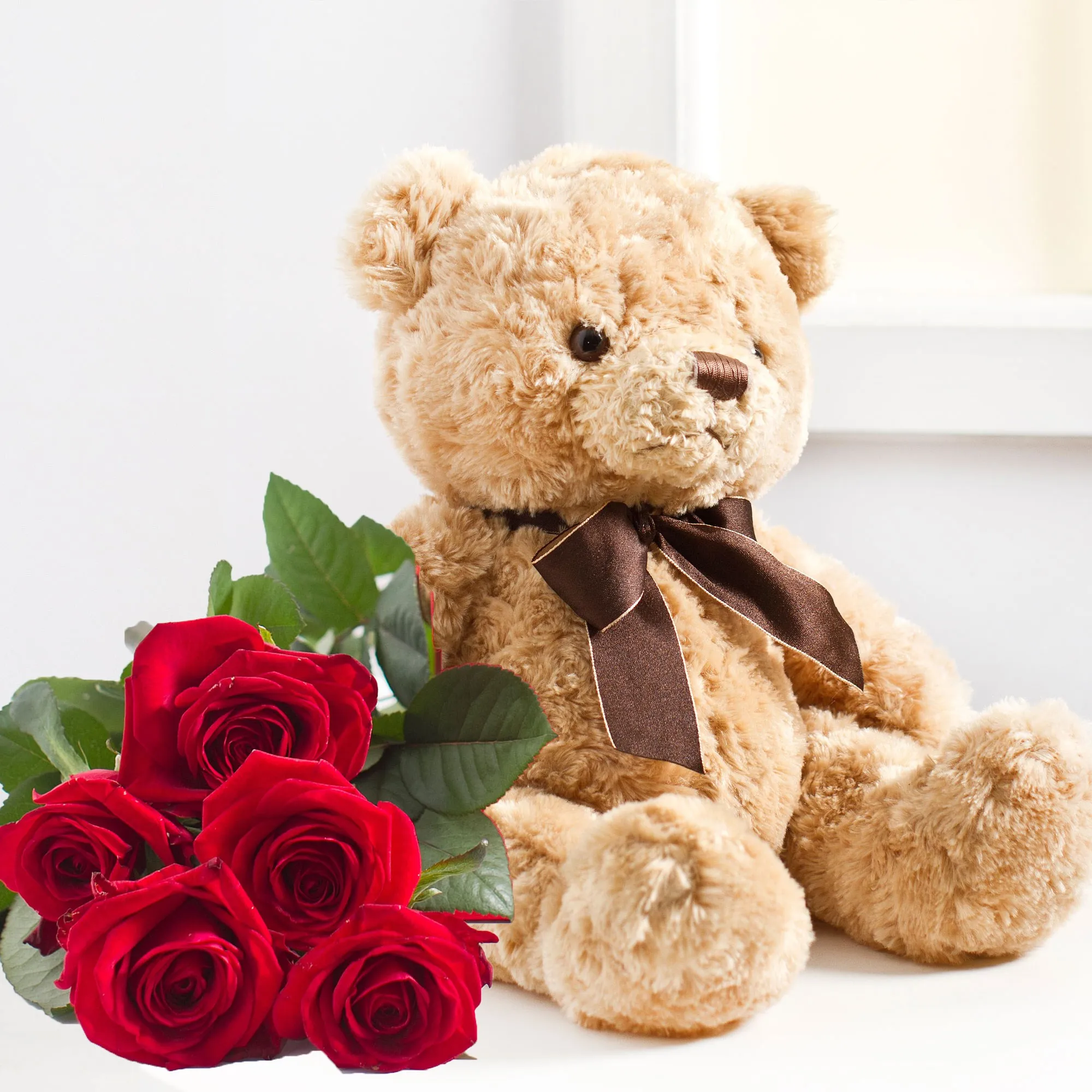 7 roses and teddy bear - Lithuania