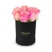 Pink roses in a black box