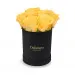 Żółte róże w czarnym pudełku