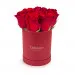 Red roses in a crimson box
