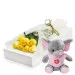 7 yellow roses with pink elephant