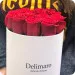 Red roses in a white box