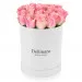 Pink roses in a white box