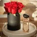 Red roses in a black box with Rêves perfume 