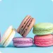 Strawberries in White and Milk Chocolate with Coconut and Nut Topping and Macaroons