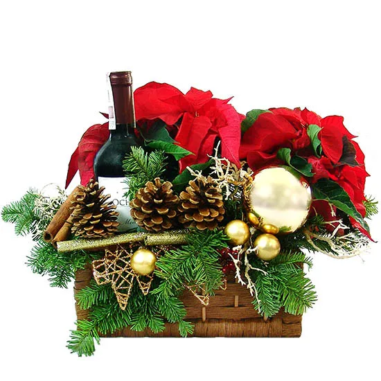 Warming centrepiece, poinsettia, cinnamon, cones, fir branches, candles, baubles, rosehip, wine in a box, reeds as a gift
