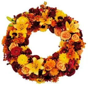 Round funeral wreath, multicolored (orange/red/yellow)