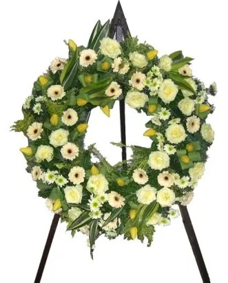 Wreath in white roses gerberas chryssis (with ribbon)