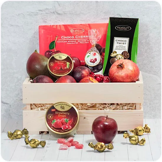 Empress's box, light wooden box, gift with fruit, chocolates and cherries in chocolate