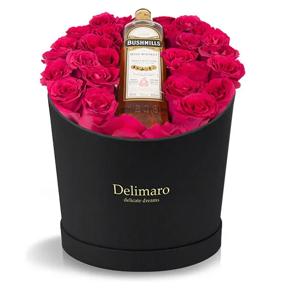 red roses in a black box, red roses, flower box with a whiskey bottle