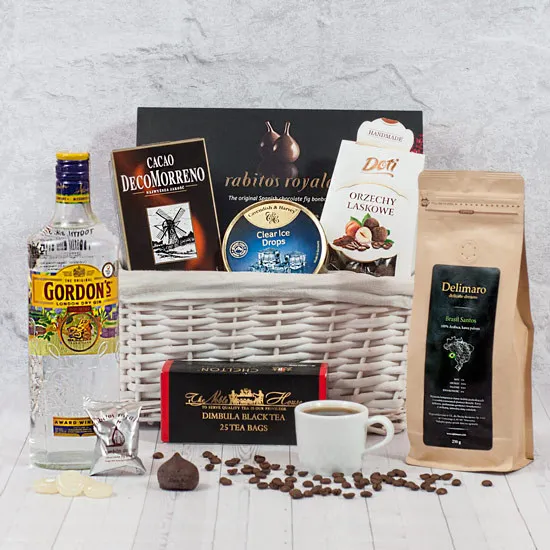 In good taste,bright gift basket, coffee beans, figs in chocolate, magic tea, nuts in chocolate, gin gordon's