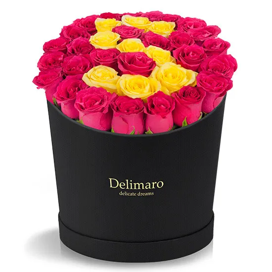 red roses in a black box, red roses, yellow roses, flowers with a letter, yellow roses arranged into an S