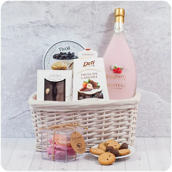 Raspberry sweetness, blueberry cookies in the basket, chocolate rose
