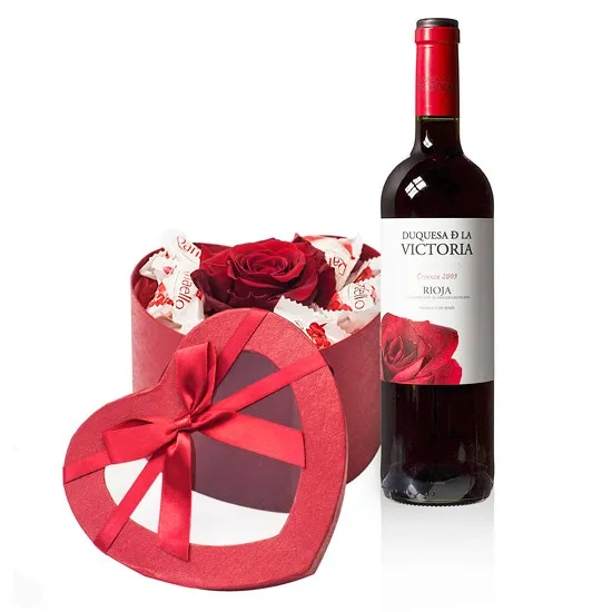 Mi amor, red wine with rose and coconut candy in a red heart shaped box