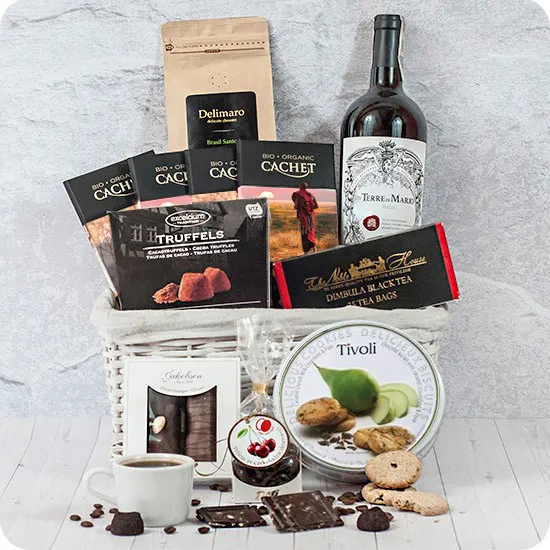 Happy evening, light basket, dark chocolate, coffee beans, dry red wine, black tea, chocolate-covered cherries, pear biscuits