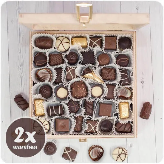 an elegant box full of pralines made of chocolate (wooden box)