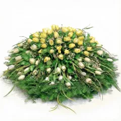 Funeral wreath with tulips, white and yellow tulips with greenery for funerals