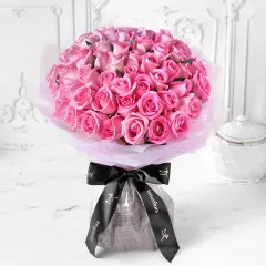 Unforgettable 50 Pink Roses Hand Tied - Indie