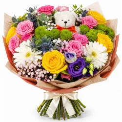 Colorful bouquet with a teddy bear