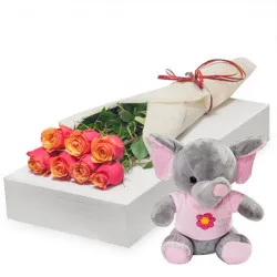 7 tea roses with pink elephant