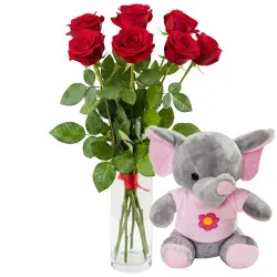7 red roses with pink elephant