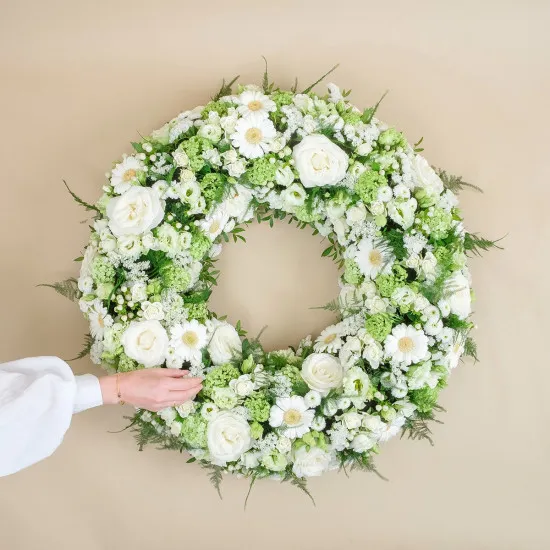 Funeral wreath with roses and gerberas