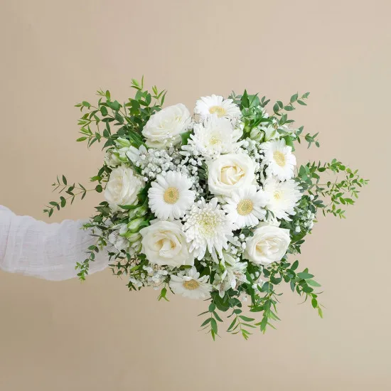 Funeral bouquet with roses and gerberas