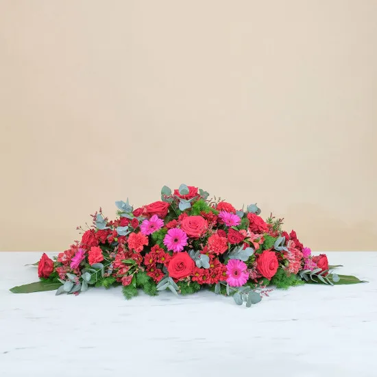 Coffin cover with red roses