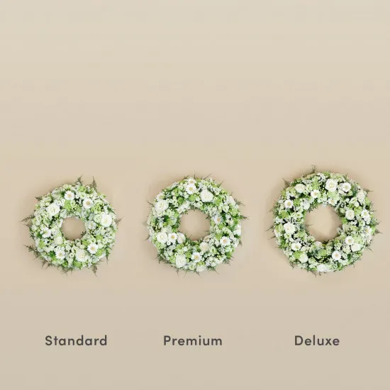 Wieniec pogrzebowy z różami i gerberami