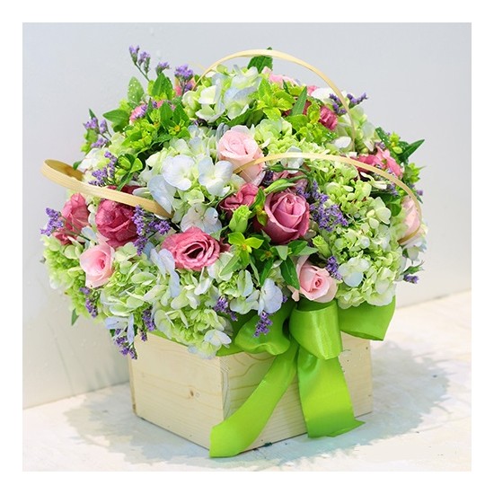 Mixed bouquet in container