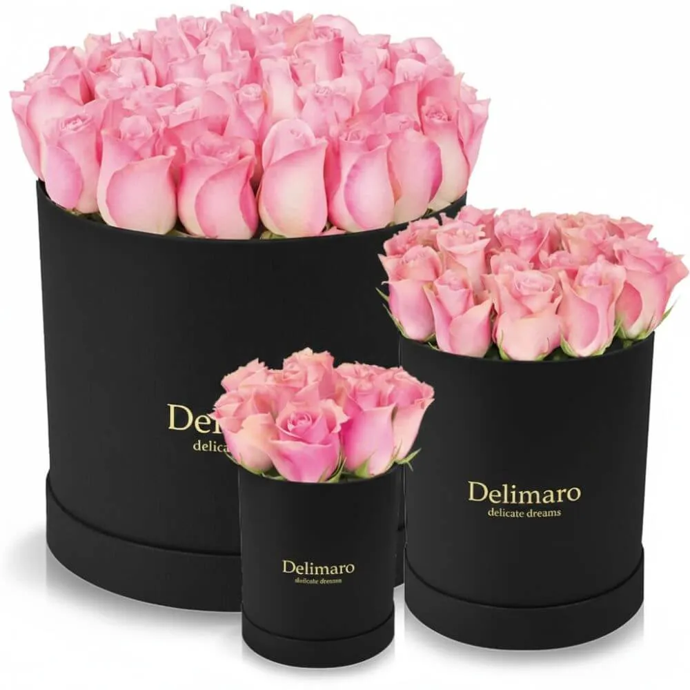 Różowe róże w czarnym pudełku
